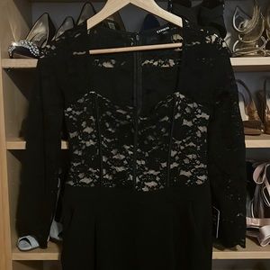 Lace black jumpsuit with long sleeves. Size small